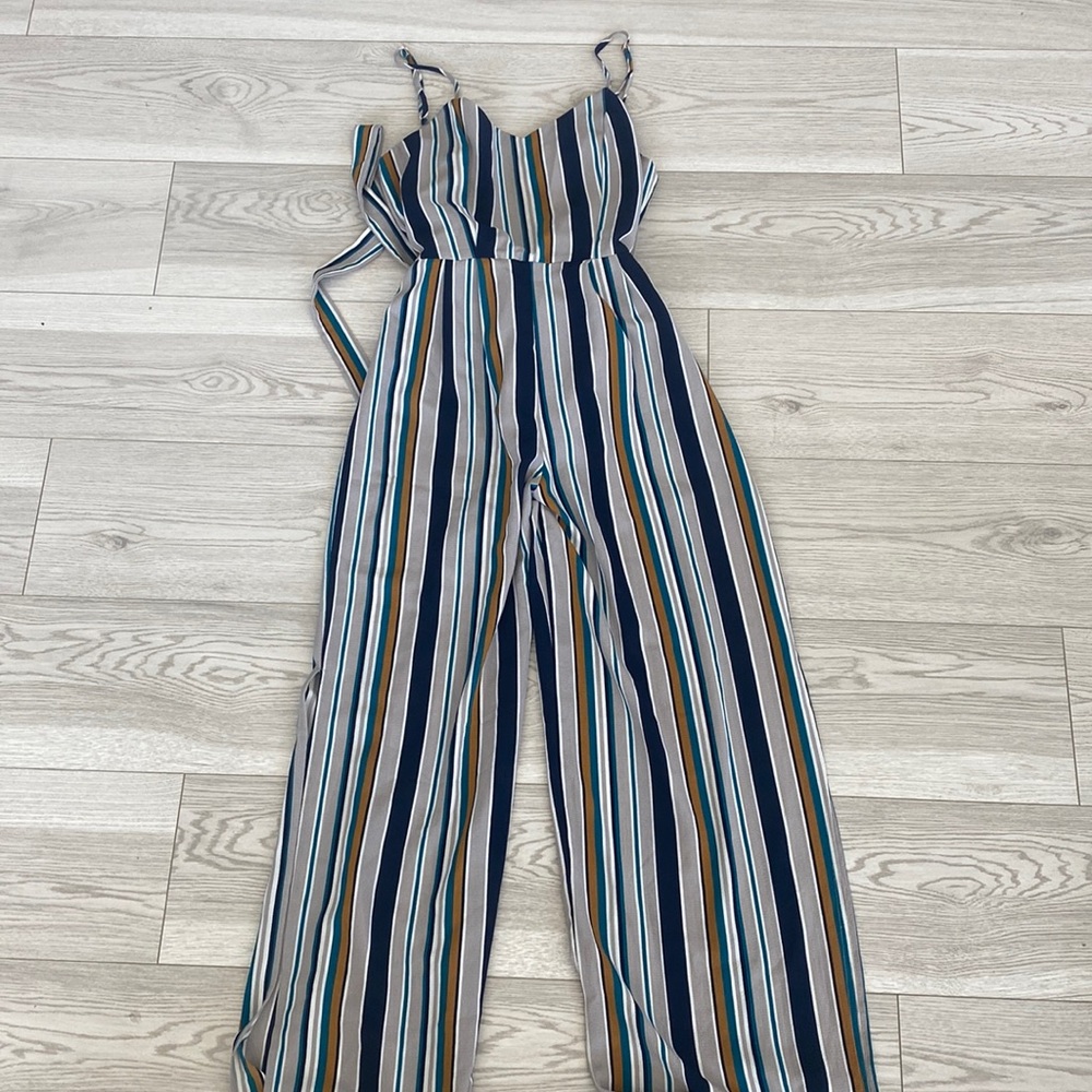 dark blue, yellow, turquoise, and grey striped casual jumpsuit